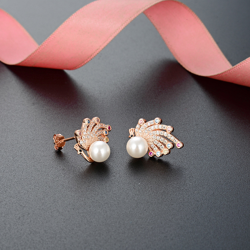 S925 plata esterlina Pavo Real perla pendientes para las mujeres al por mayor diseño de moda sentido nicho temperamento ZIRCON rebordear pendientes