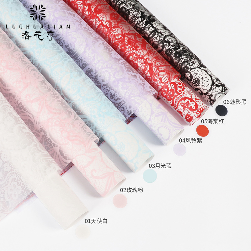 Al por mayor nuevo tipo de flores amor hansu papel floral material de embalaje de flores engrosado patrón impermeable ramo de papel de embalaje