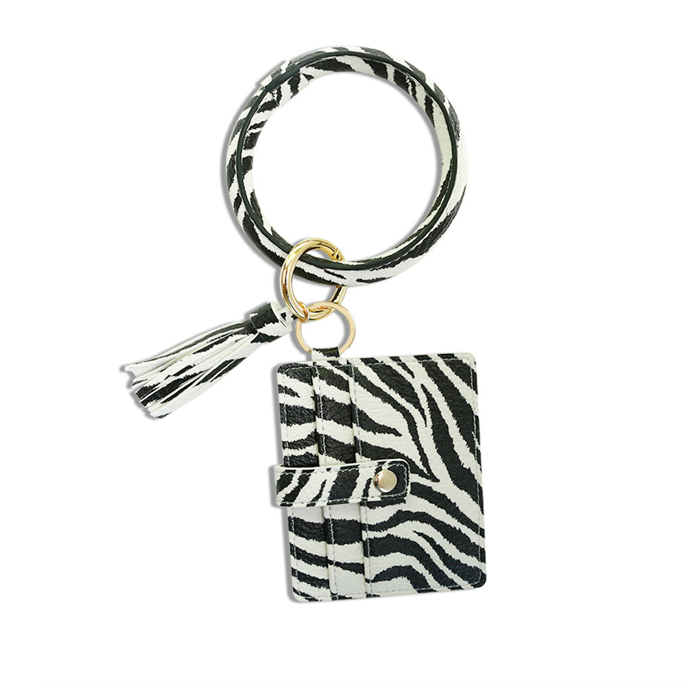 Amazon nuevo año de la serpiente muñequera PU cuero gran capacidad tarjetero clave monedero pulsera llavero colgante