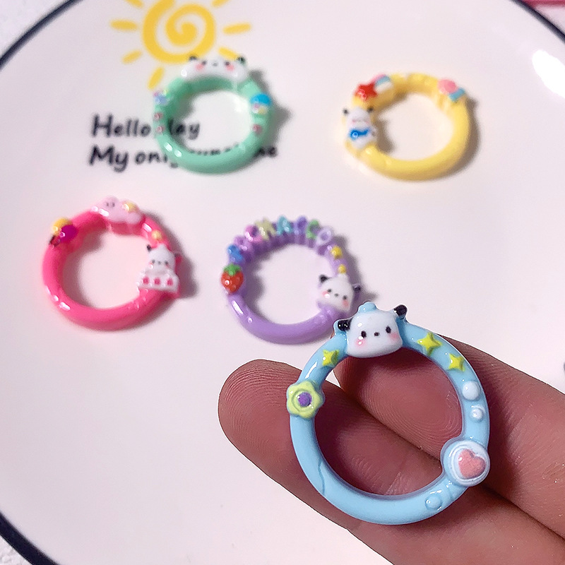 Nuevos dibujos animados Sanrio Pacha imitación anillo abierto DIY accesorios de resina adornamiento para el cabello crema caja de teléfono móvil llavero