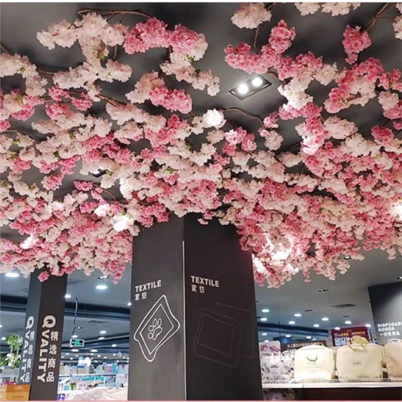インターネット有名人の壁模擬桜の枝偽桃の花緑の植物天井屋内天井フラワールームトップ籐装飾造園|undefined