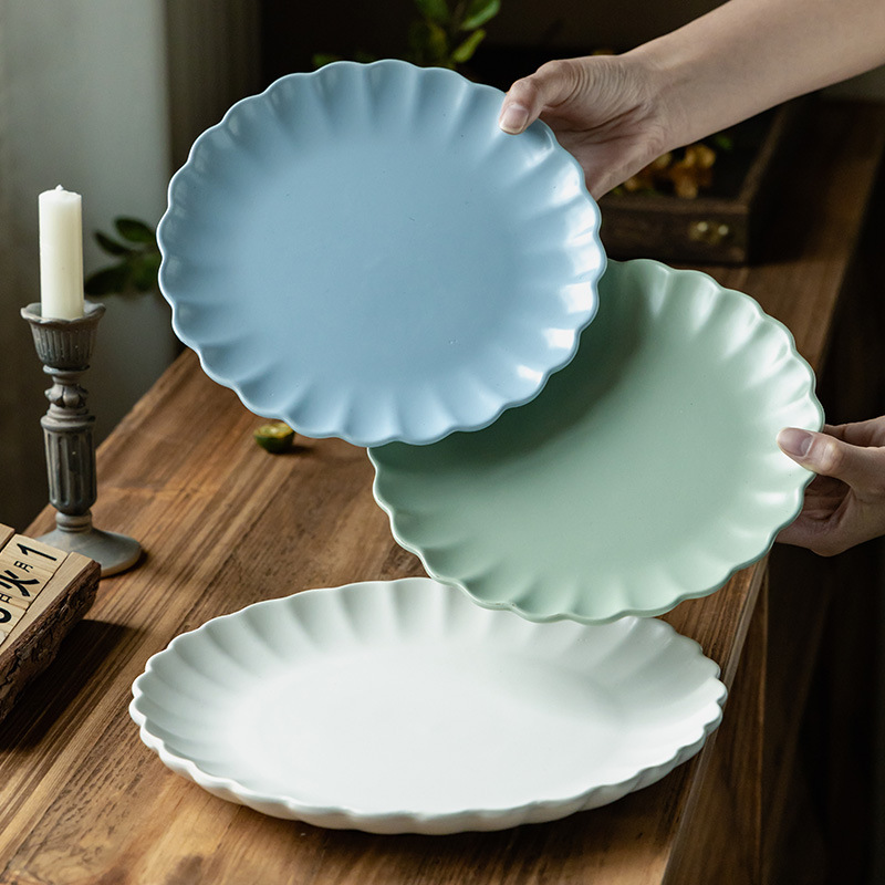 Plato de floración simple de color sólido, plato de cerámica occidental de alto valor, plato redondo doméstico, plato de cubiertos al por mayor