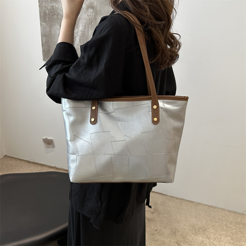 Textura de cuero suave bolso grande para mujeres 2024 nueva moda de gran capacidad bolso de hombro de alta calidad TOT bolso de mano universal