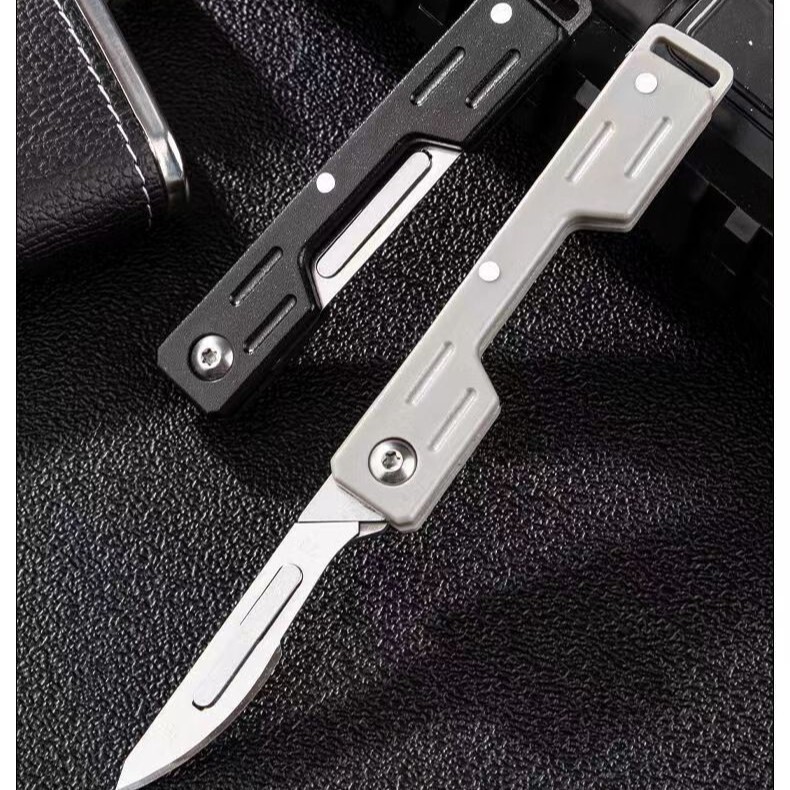 ハイエンドのチタン合金ポータブル折りたたみ手術ハンドル、鋭い多機能キーホルダーナイフ、交換可能な刃のユーティリティナイフ|undefined
