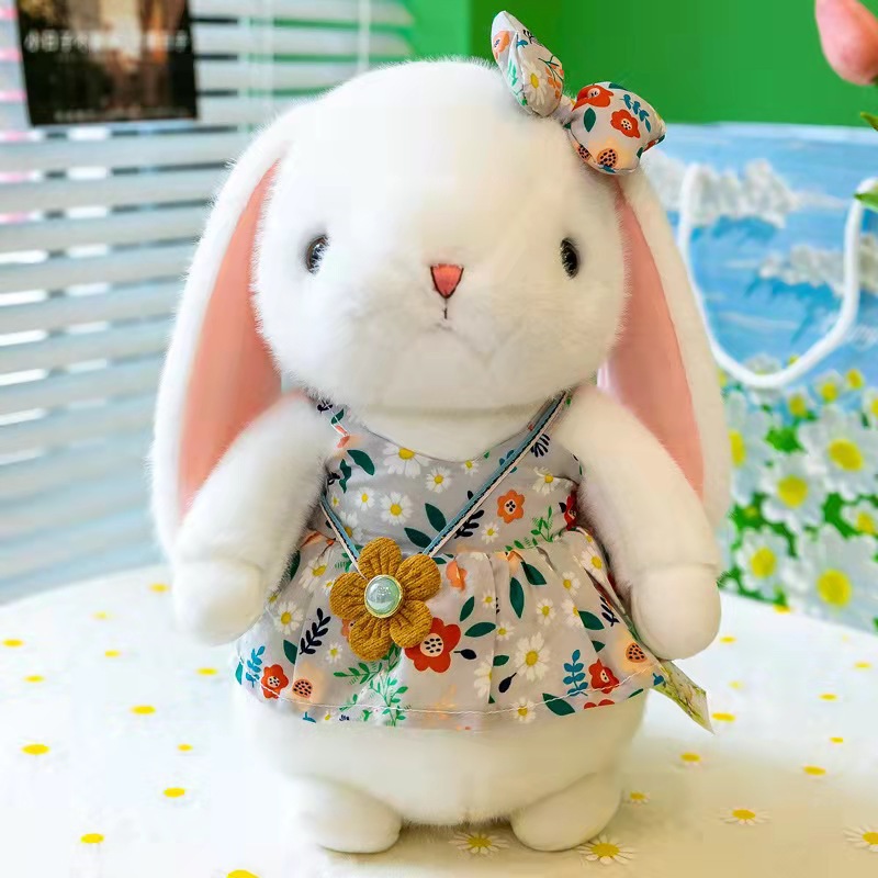 Nueva pastoral conejo muñeca de juguete lindo vestido la flor conejito agarrar máquina muñeca al por mayor