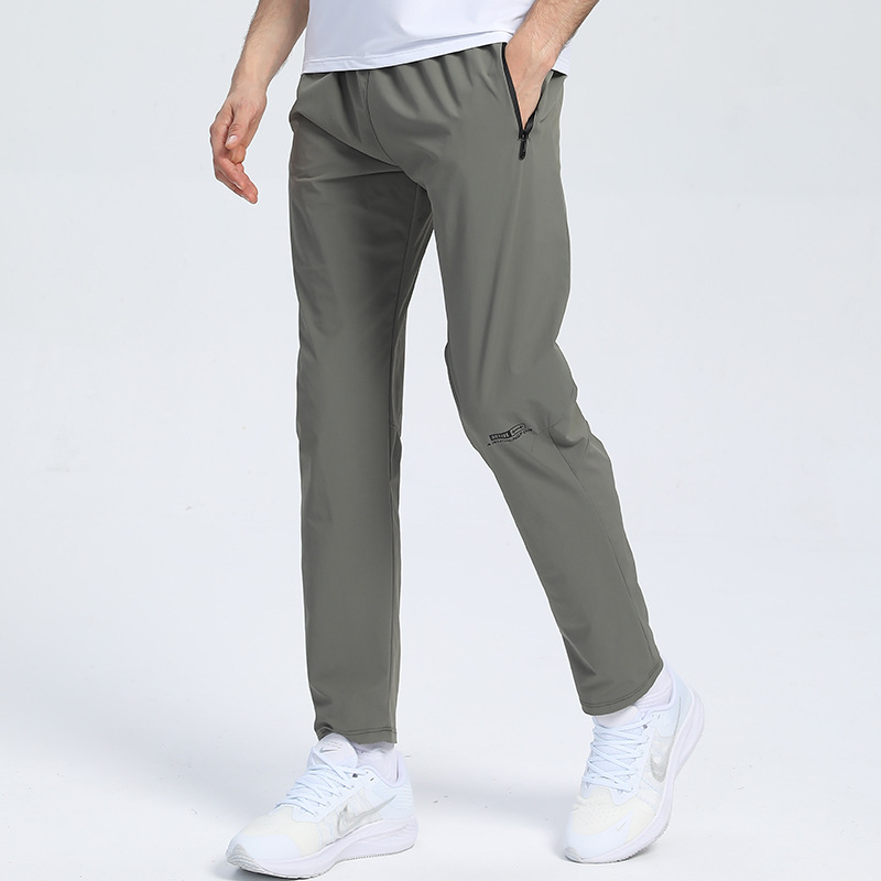 Pantalones deportivos de nylon transfronterizos para hombres en stock pantalones impresos de fitness elásticos hasta los tobillos pantalones de verano transpirables que absorben el sudor