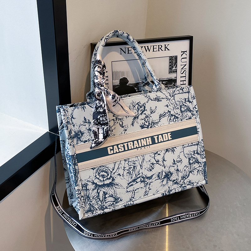 Bolsos de lona transfronterizos bolsos de mujer 2025 nueva moda retro letras impresas bolsos de hombro de gran capacidad