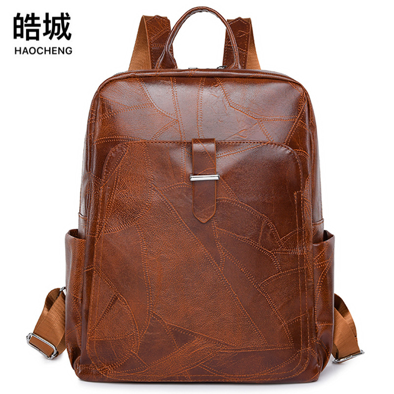 2024 nueva mochila de cuero suave casual para mujer, simple y versátil, anti-salpicaduras de agua, mochila de viaje al aire libre, mochila escolar al por mayor