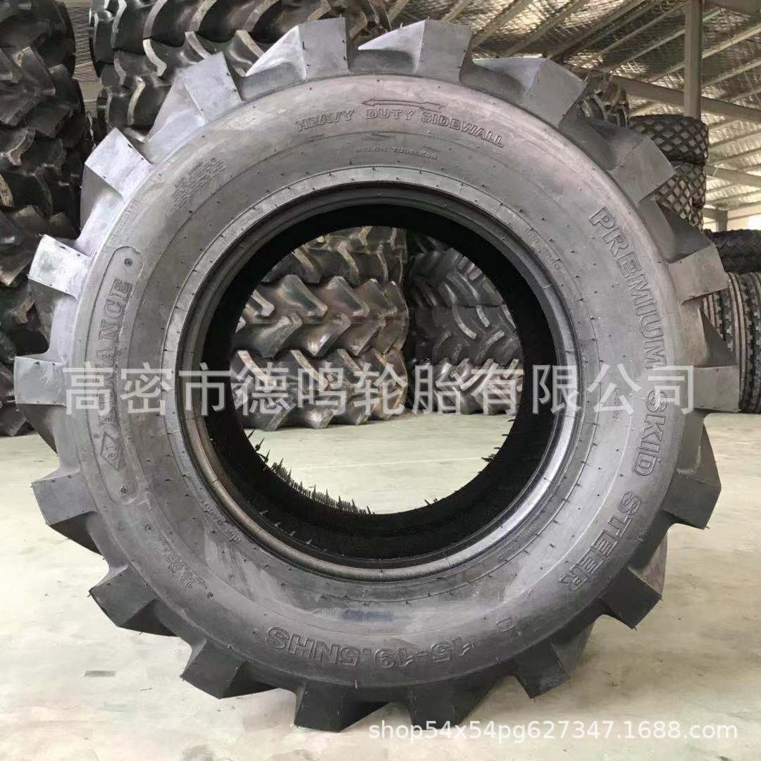 Suministro de maquinaria de construcción excavadora neumático 15-19.5 SKID STEER cargador de neumáticos engrosamiento