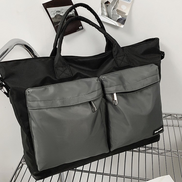 跨境新款日系短途旅行包女潮流拼色大容量手提包男休闲外出斜挎包