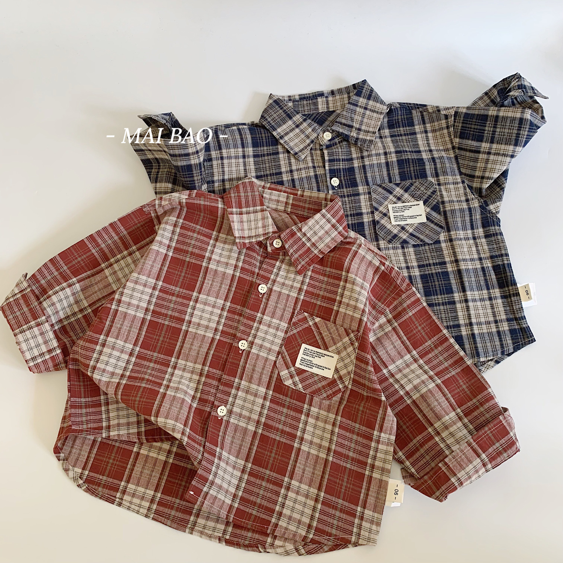 Camisas infantiles Mai Bao 2025 primavera y otoño nuevos productos de algodón para niños cuello cuadrado camisa de manga larga chaqueta de aire extranjero bebé
