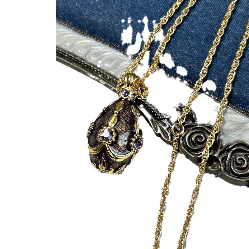 Vintage Russian Egg Necklace With Purple Enamel & Diamond Detail_voghion.com