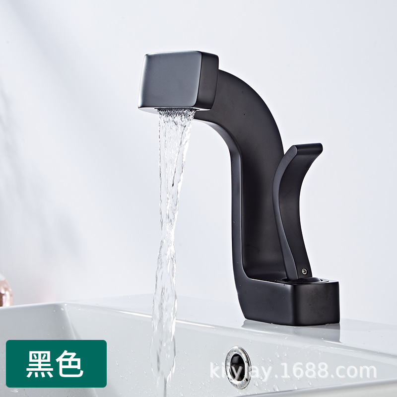 Grifo de agua fría/caliente válvula de cobre para lavabo transfronterizo con baño de oro de dos tonos.