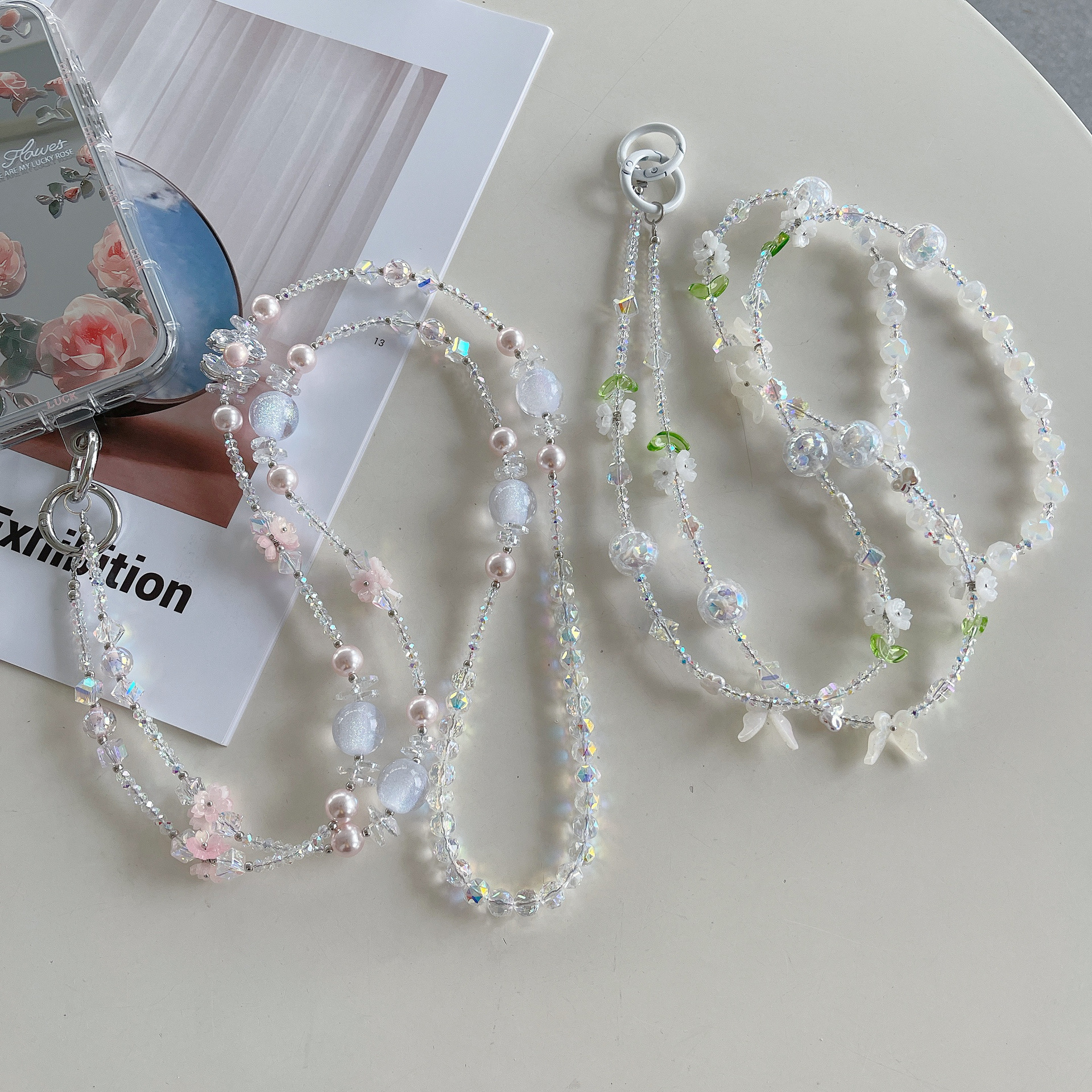 Boutique hecho a mano de alta gama para teléfono móvil cadena larga de cristal ins fresco cordón de teléfono móvil de moda colgante de mensajero largo