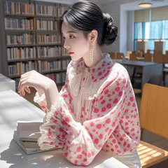2025年の新型の小さいシャツはとても綺麗で、独特な綺麗なフランス風の小さい香りの高級感のピンクのプリントの長袖の上着です。