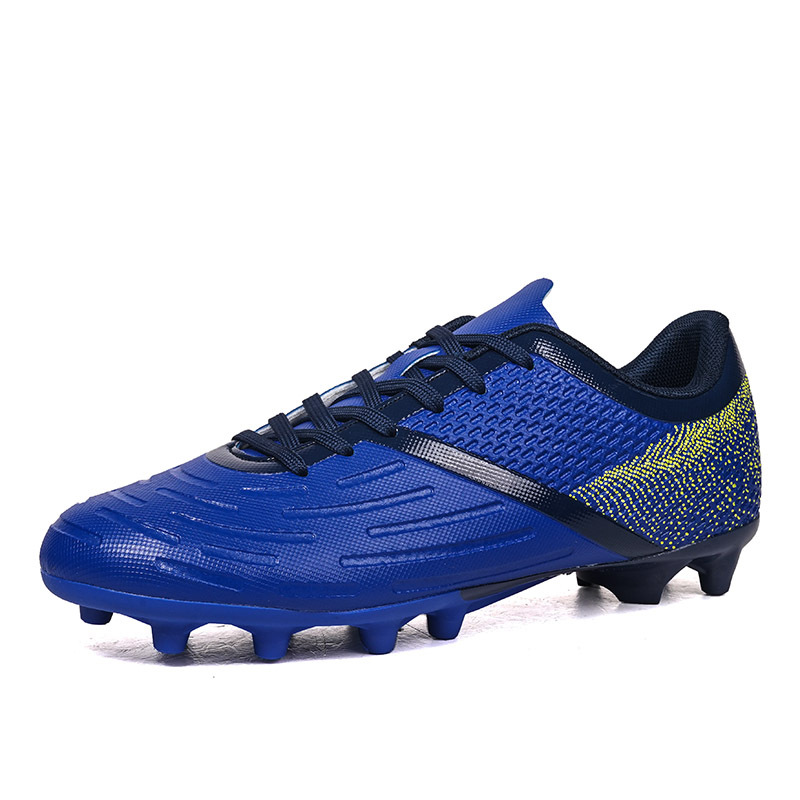 2025 nuevos zapatos de fútbol juvenil de clavos largos transfronterizos para hombres y mujeres zapatos de entrenamiento de competencia de estudiantes fábrica