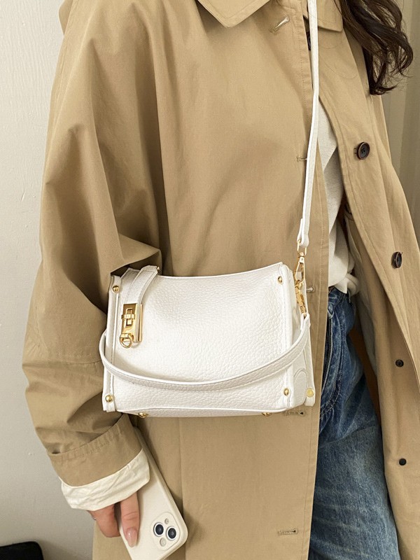 Nicho Zhong textura bolso de mujer 2026 nuevo remaches de gran capacidad simple de hombro simple bolso de brazo de viaje