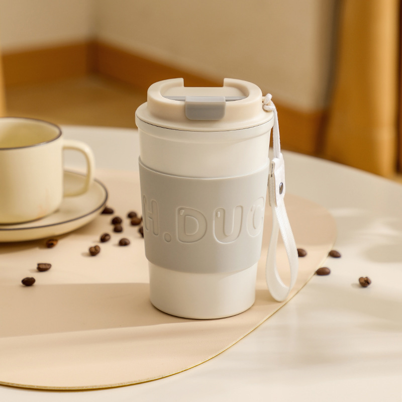 Sudeste asiático popular taza de café de dibujos animados de alta apariencia portátil ventosa coche 304 Acero inoxidable portátil taza de agua