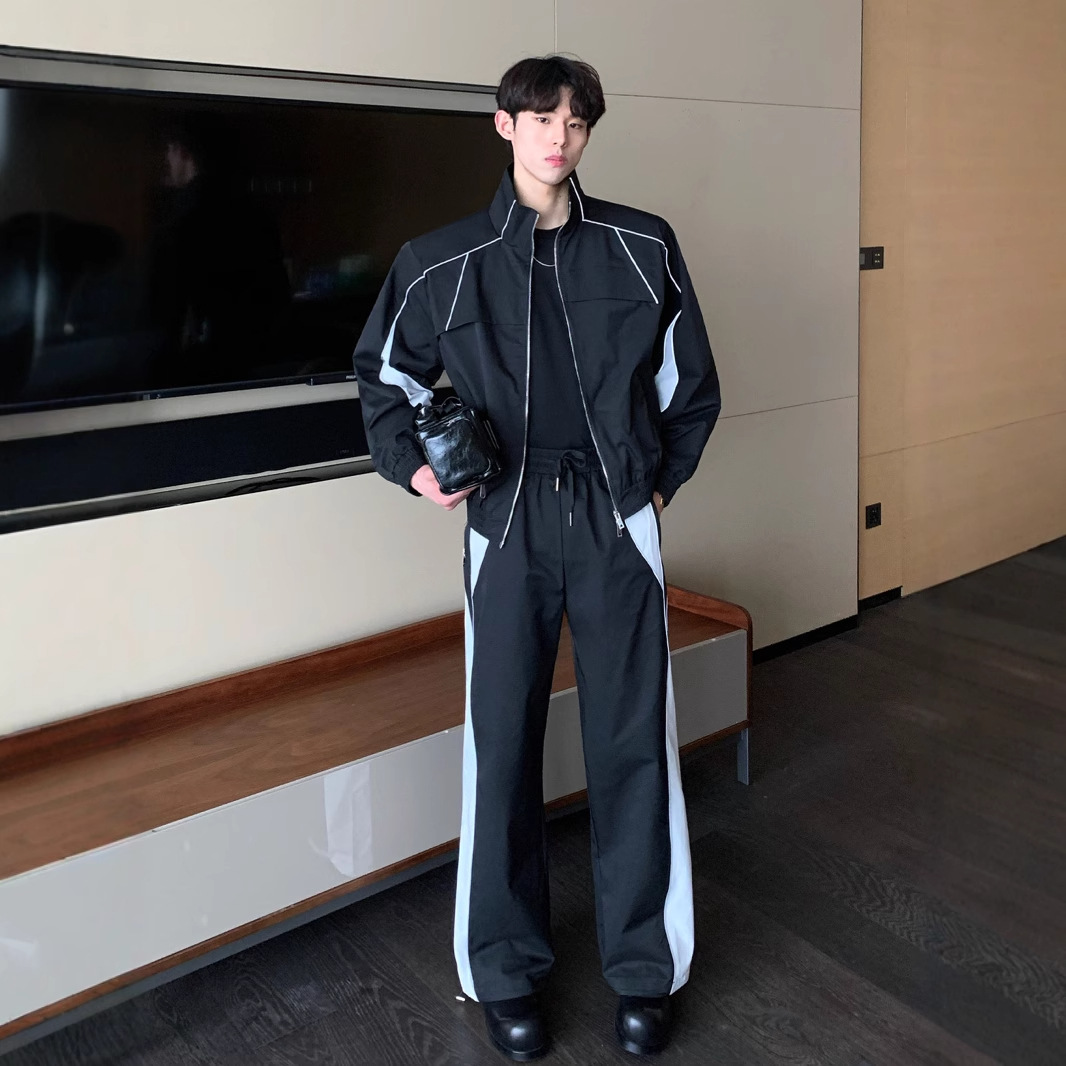 厂家直供秋季撞色拼接反光立领夹克外套套装直筒休闲长裤两件套潮