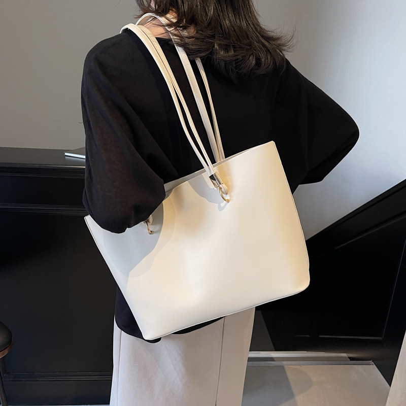 Bolsa de compras relajada para mujeres 2024 nueva moda europea y americana simple atmósfera bolsa de hombro de cuero suave sensación de viaje bolsa