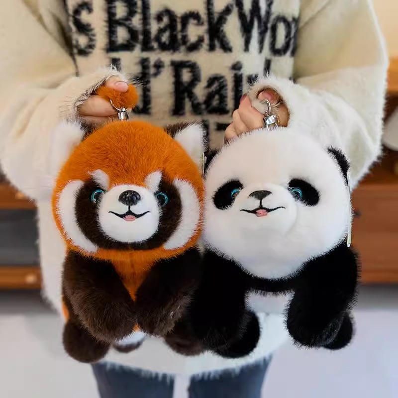 Venta al por mayor linda fiesta panda Hanhan peluche mapache muñeca muñeca creativa bolso de mensajero para niños