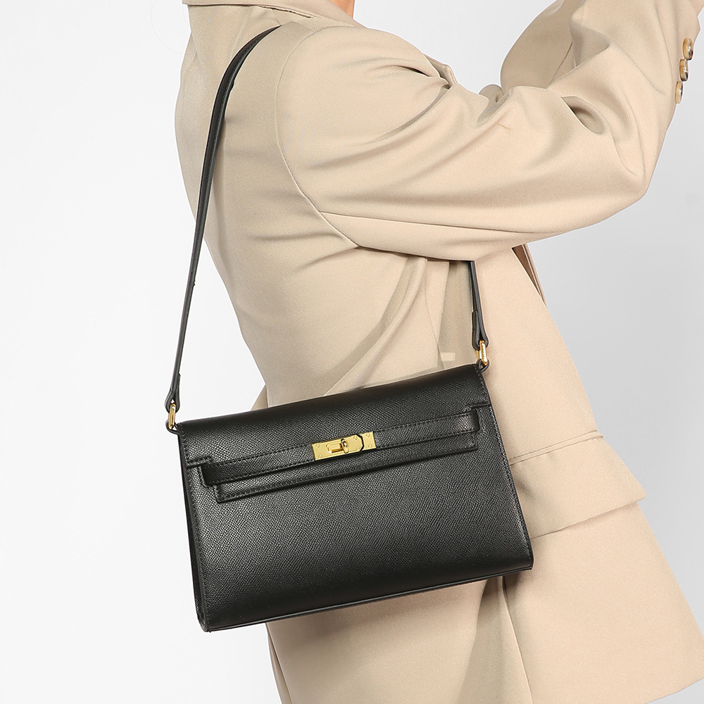 El nuevo bolso Kelly en otoño e invierno de 2024 está lleno de bolsos para mujeres con un solo hombro y axilas, y el diseño de nicho es un bolso de palo de textura avanzada.