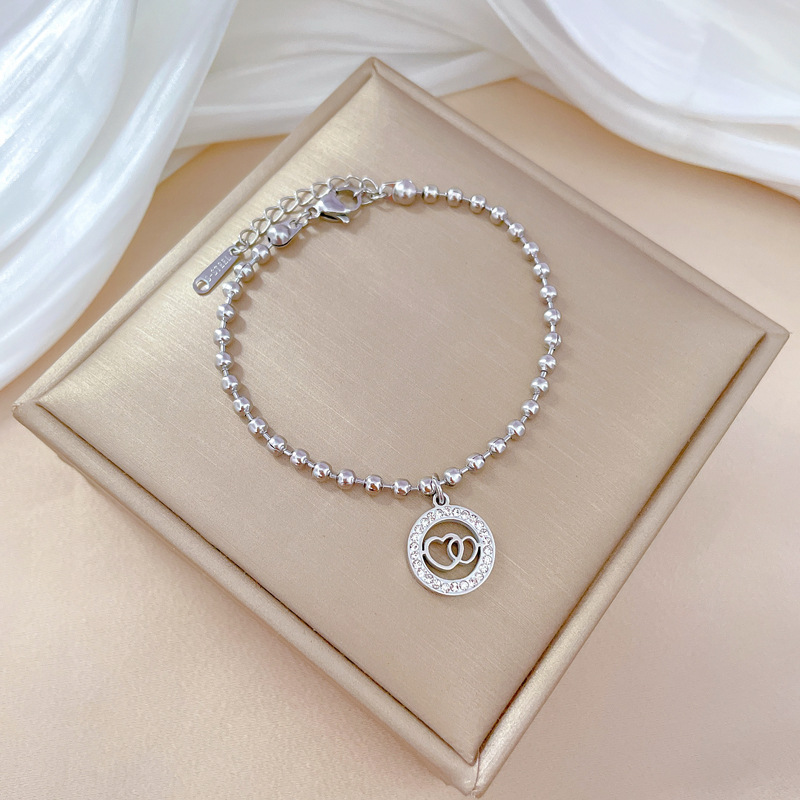 Bracciale doppio anello con perline per donna_voghion.com