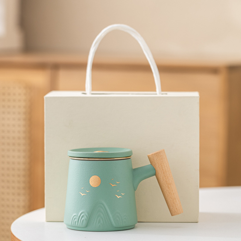 Guofeng Wenchuang marca taza de cerámica Zhoushan tres piezas juego de regalo de mano taza de calentamiento tallado comercial LOGO nombre