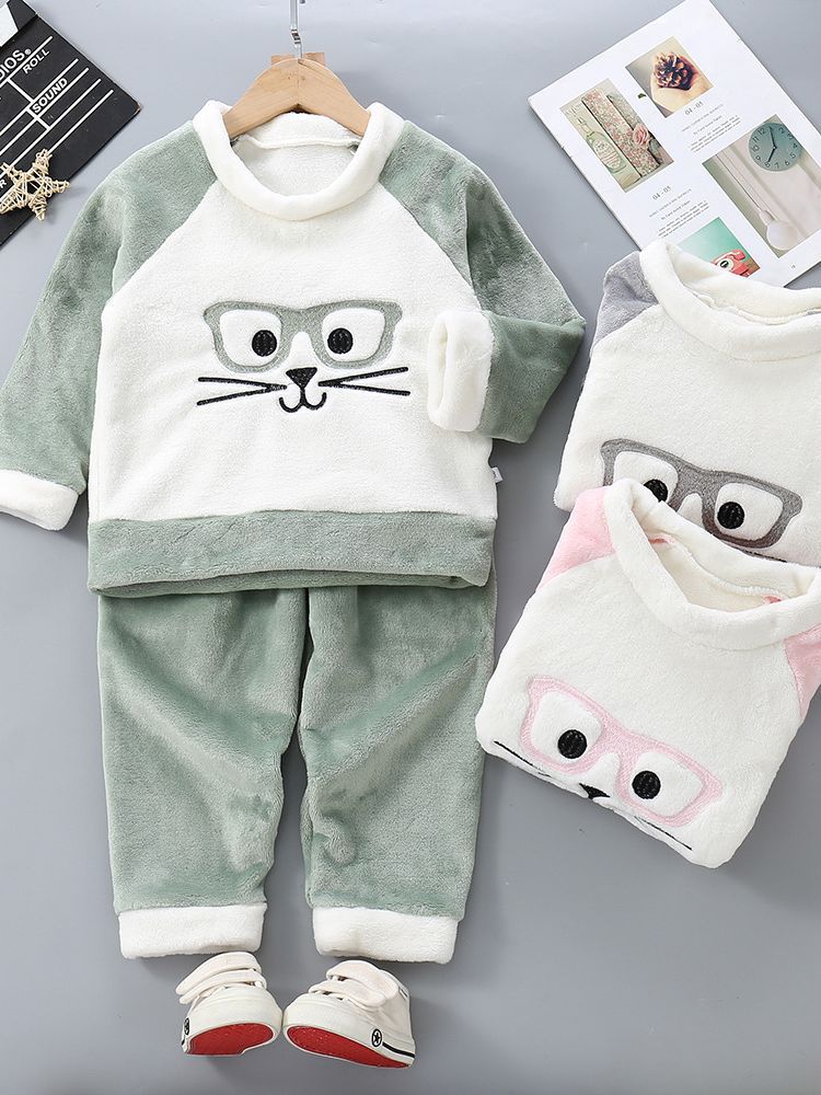 2023 Otoño e Invierno nuevos niños y niñas forrados de lana engrosada cálido traje infantil de dibujos animados franela homewear Pijamas