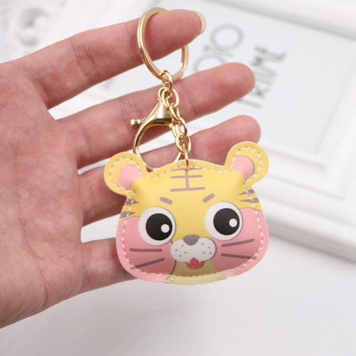Cross-border classic cute little tiger PU leather keychain European and American student schoolbag tiger car pendant