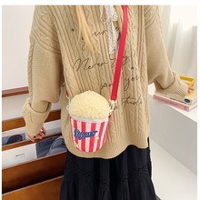 2025春夏新款潮搭单肩斜挎包爆米花搞怪零钱包轻便手机毛绒水桶包