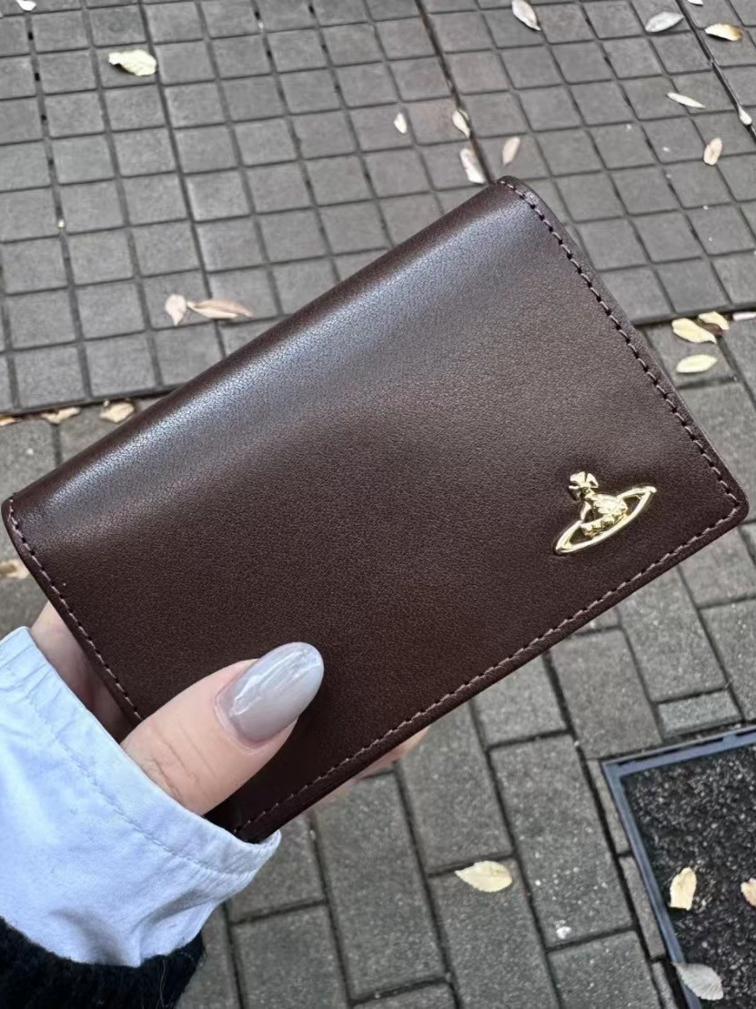 Bolso de tarjeta de nicho británico Saturn logo bolso de mano de color sólido cartera horizontal portatarjetas bolso unisex marrón