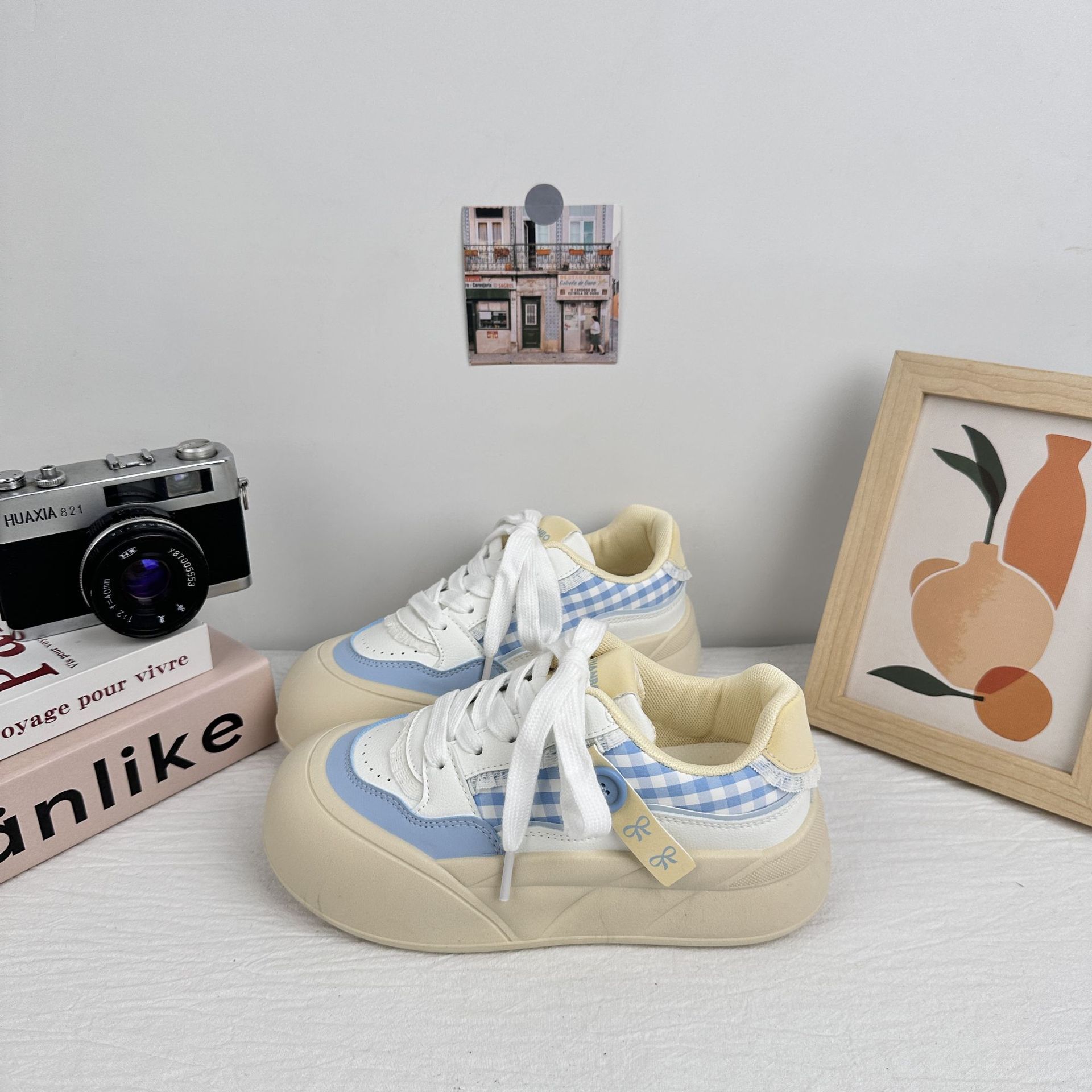 Zapatos de onda lejana para mujer 2025 nuevos zapatos de pan de estilo caliente zapatos blancos de suela gruesa zapatos de tabla zapatos casuales de nicho de todo fósforo