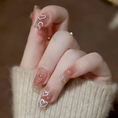 Long-style nail tips, detachable wearable nails—blingy diamond designs with explosive sparkle, wholesale available. Elegant, lightweight heart-shaped embossed designs, ready-to-use.
