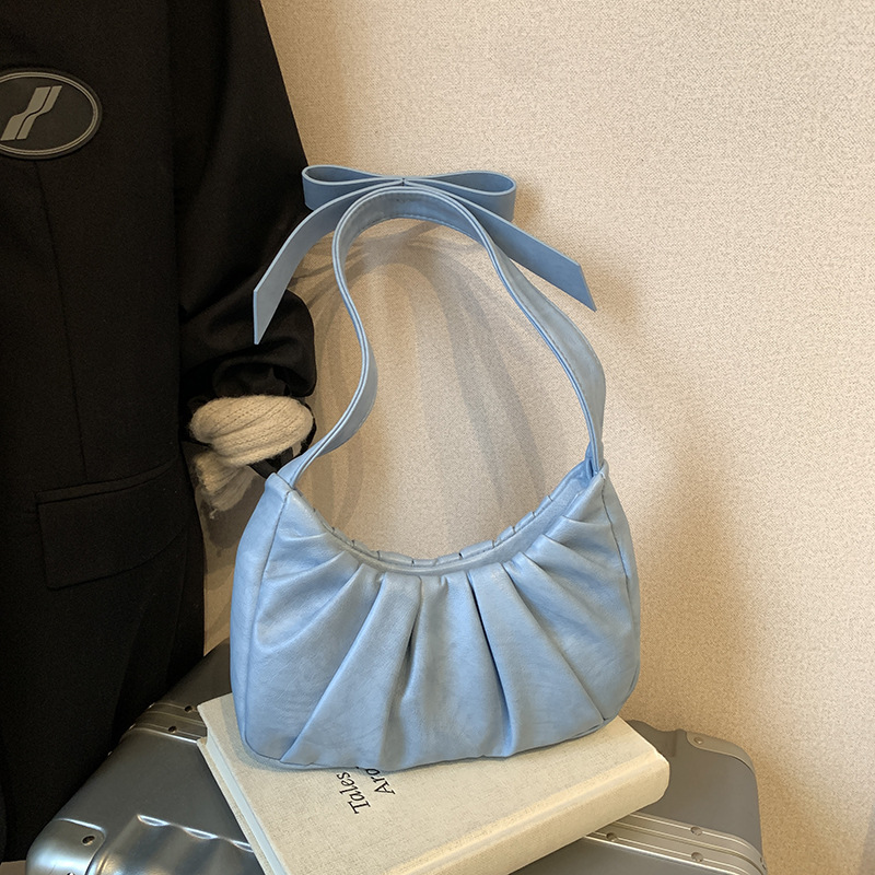 Bolso de axila popular de este año 2025 primavera y verano nuevo bolso femenino lindo bolso de lazo bolso de hombro plisado de moda
