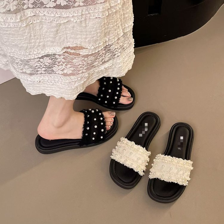 Zapatillas de perla con sandalias de falda 2026 verano nuevo tacones bajos casuales cómodas zapatillas de viento