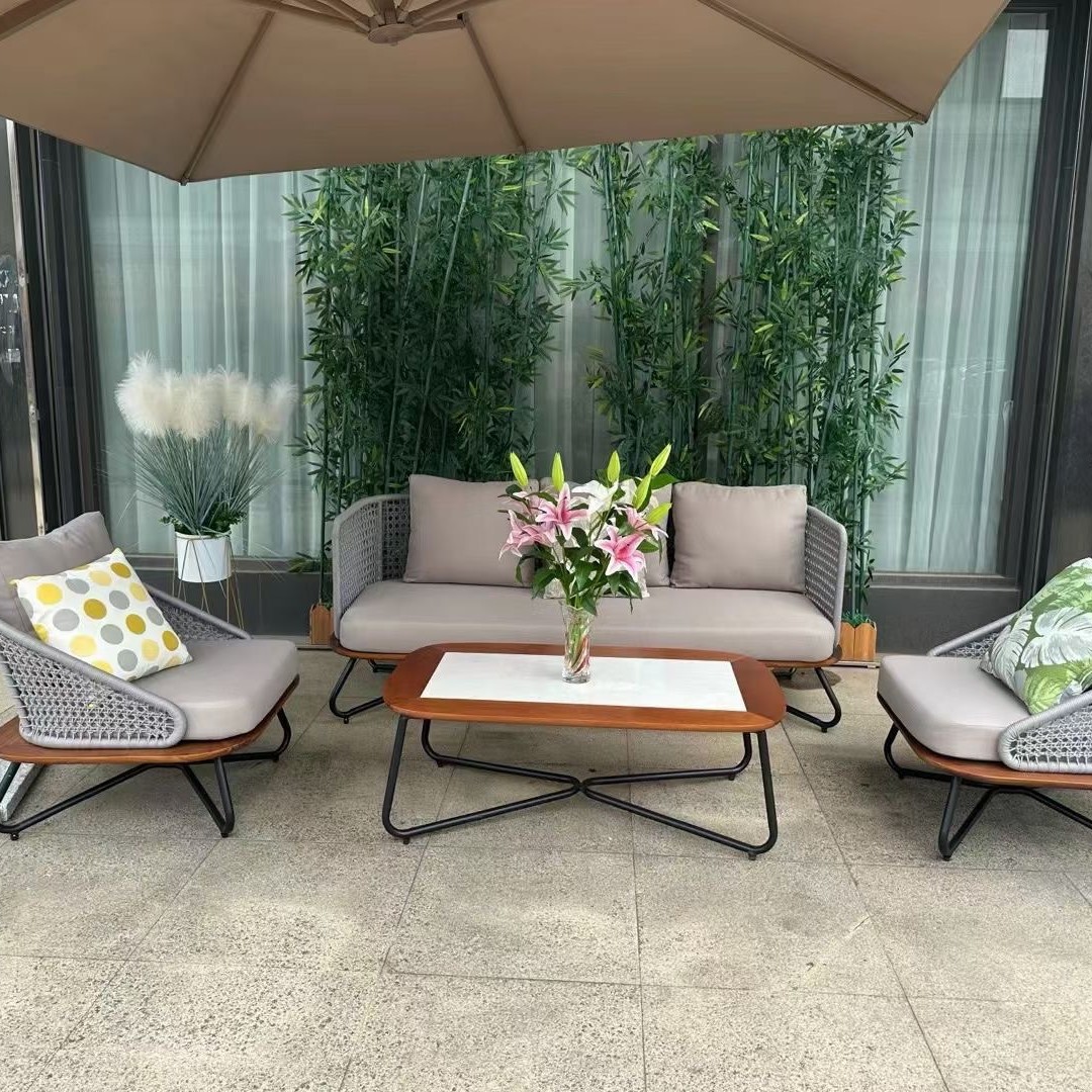 Ocio al aire libre balcón de caña mesa de té combinación de tres piezas de alojamiento residencial patio hotel villa sofá estilo nórdico