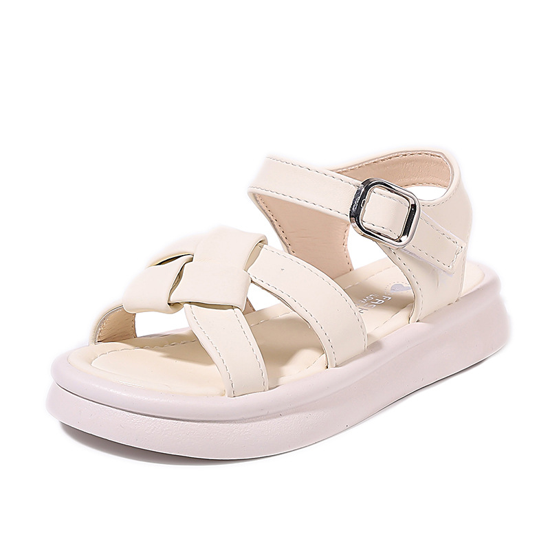 Zapatos de playa suaves para niñas 2026 verano nuevo estilo de moda infantil universal zapatos princesa huecos de dedos abiertos zapatos de moda romana