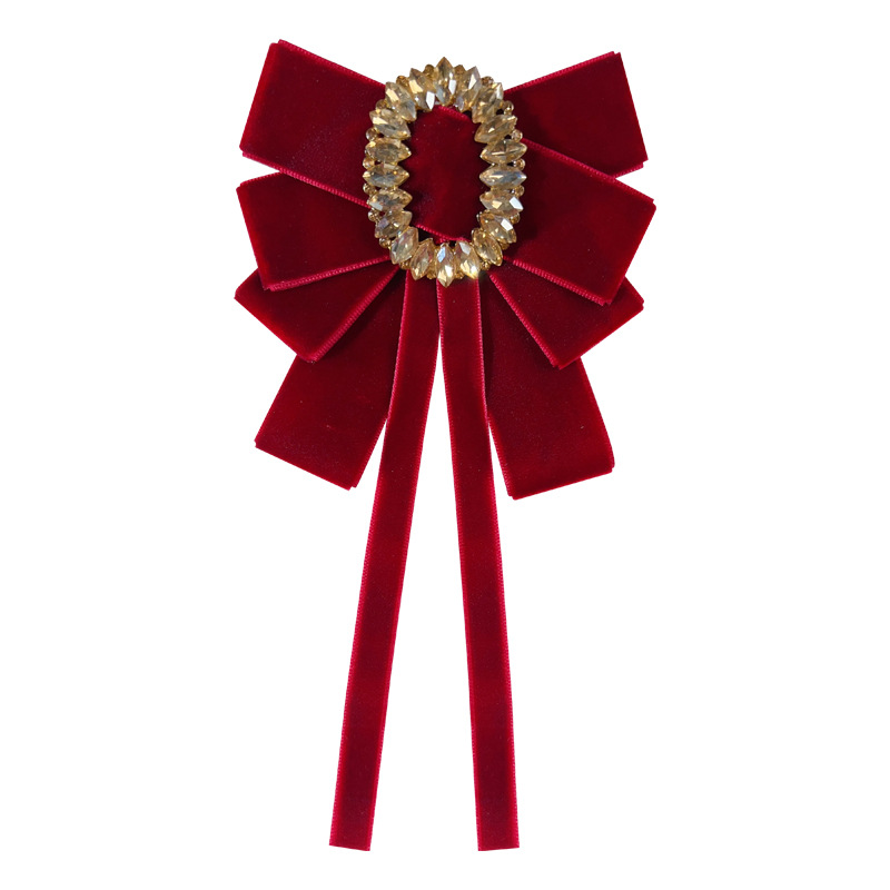 Joyería transfronteriza Otoño e Invierno estilo Chanel Estilo Vintage terciopelo negro arco de alto grado de oro pajarita broche femenino venta al por mayor