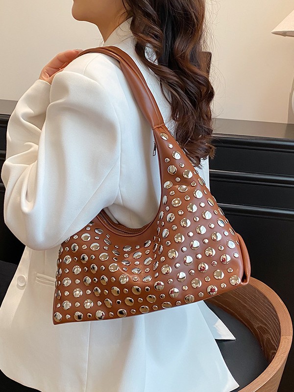 Bolso de mujer venta caliente nuevo nicho coreano Zhong remaches de gran capacidad bolso de alta calidad bolso de brazo de hombro universal