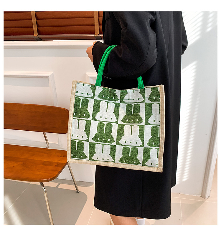 High-end mid-capacity canvas school commuting handbag 2024 new style fashionable and versatile linen single-shoulder tote bag undefined