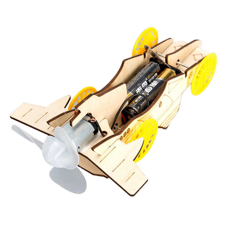 Estudiantes de primaria creativos experimentos científicos DIY juguetes de ciencia y tecnología pequeños coches de viento coches de madera neumáticos