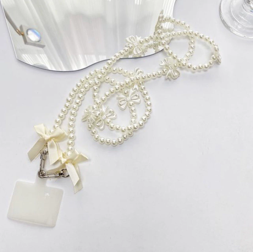 Brand strap, phone case, shoulder bag from pearl, backpack with bow