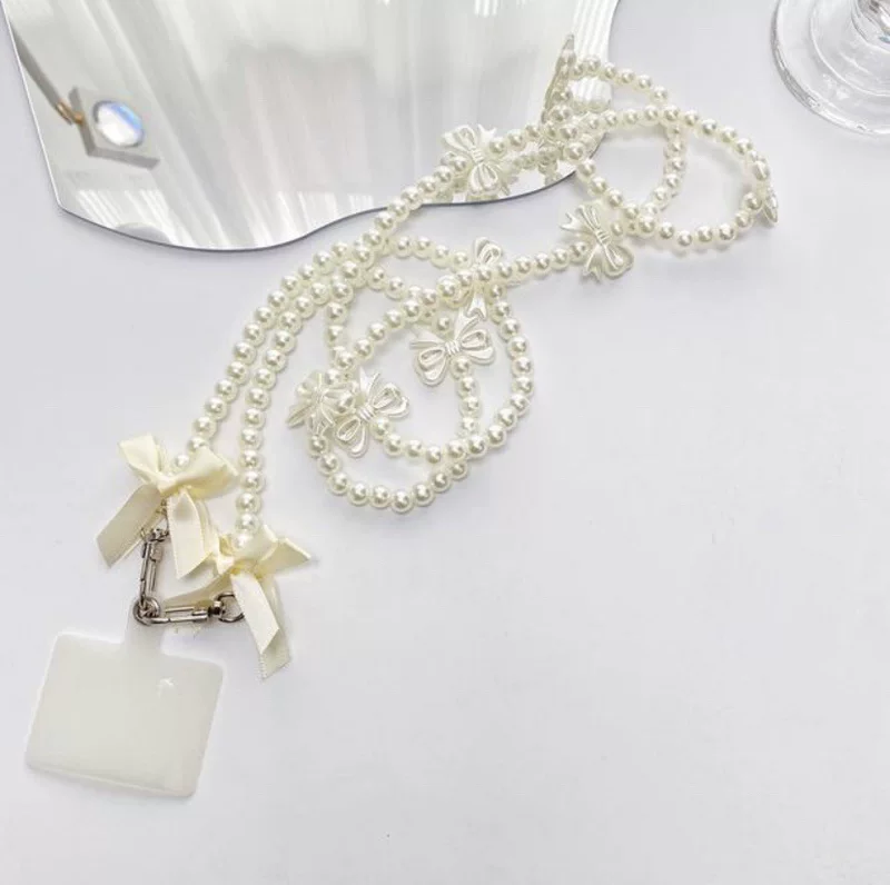 Brand strap, phone case, shoulder bag from pearl, backpack with bow