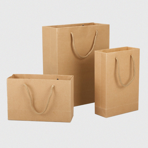 Thickened primary color single-sided kraft paper hand carry bag wholesale clothing packaging bag printed logo shopping bag