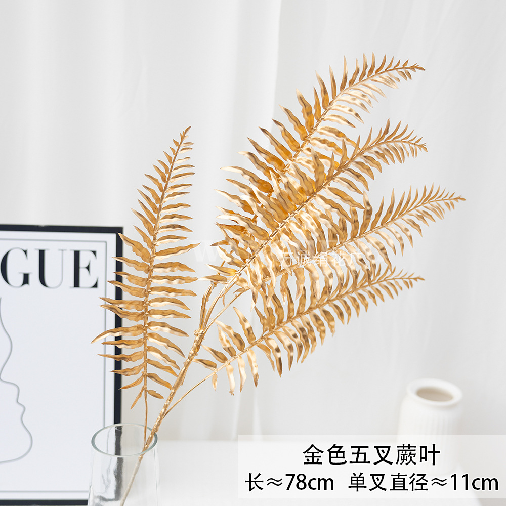 Flores artificiales doradas para Navidad