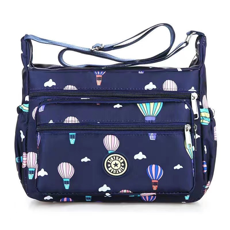 Bolsa de tela de flores bolsa de mensajero de las mujeres nueva bolsa de Madre de gran capacidad bolsa de hombro individual de mediana edad y ancianos bolsa de tela Oxford bolsa