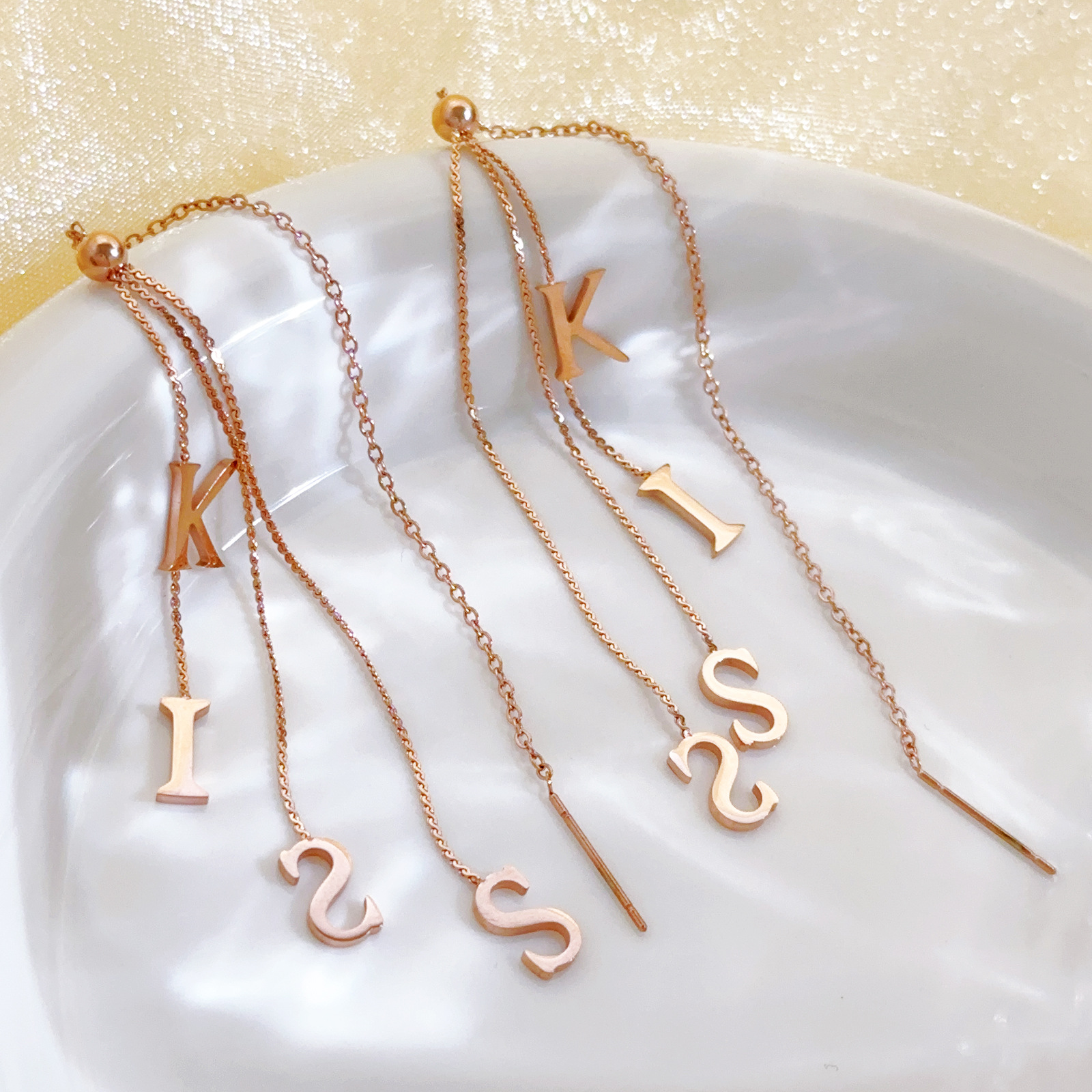 KISS estilo francés temperamento simple orejas de oro rosa alta sensibilidad mujer acero inoxidable titanio orejas de acero bordas largas