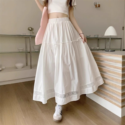 White lace-trimmed half skirt with A-line large hem, loose-fitting high-waisted, suitable for summer with French style.