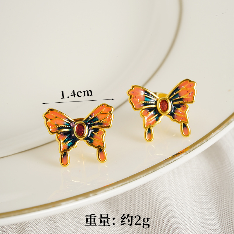 Vietnam Shajinshan Wild Tea Butterfly Collar Moda femenina Advanced Sense Ventana vacía Esmalte Butterfly Juego exquisito de tres piezas con accesorios